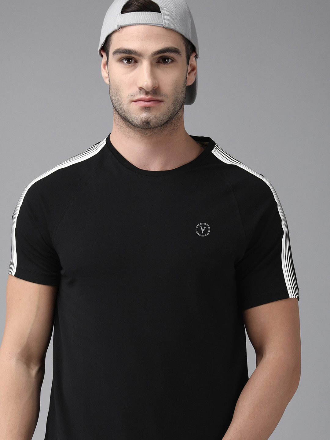 

Van Heusen Flex Men Black & White Solid Slim Fit T-shirt
