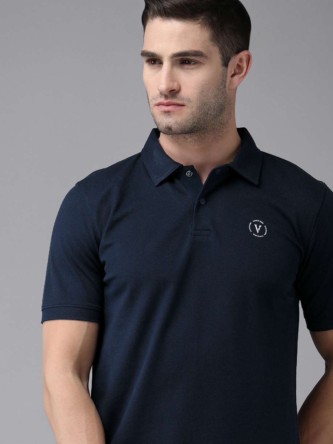 

Van Heusen Flex Men Navy Blue Solid Polo Collar Pure Cotton T-shirt