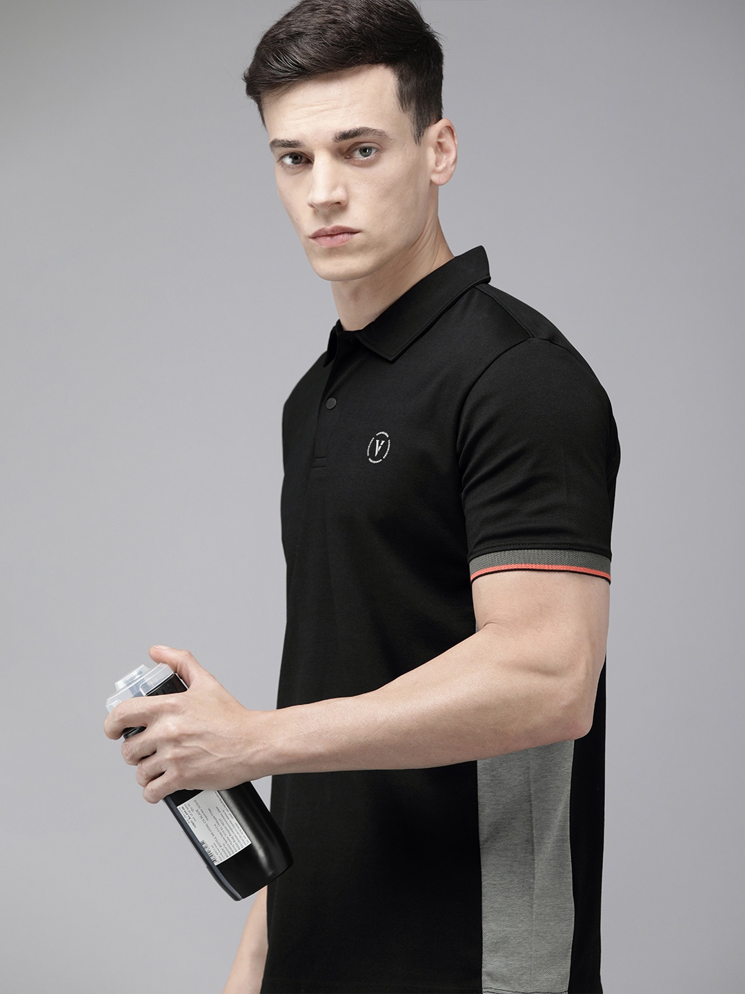 

Van Heusen Flex Men Golf Solid Polo Collar T-shirt, Black