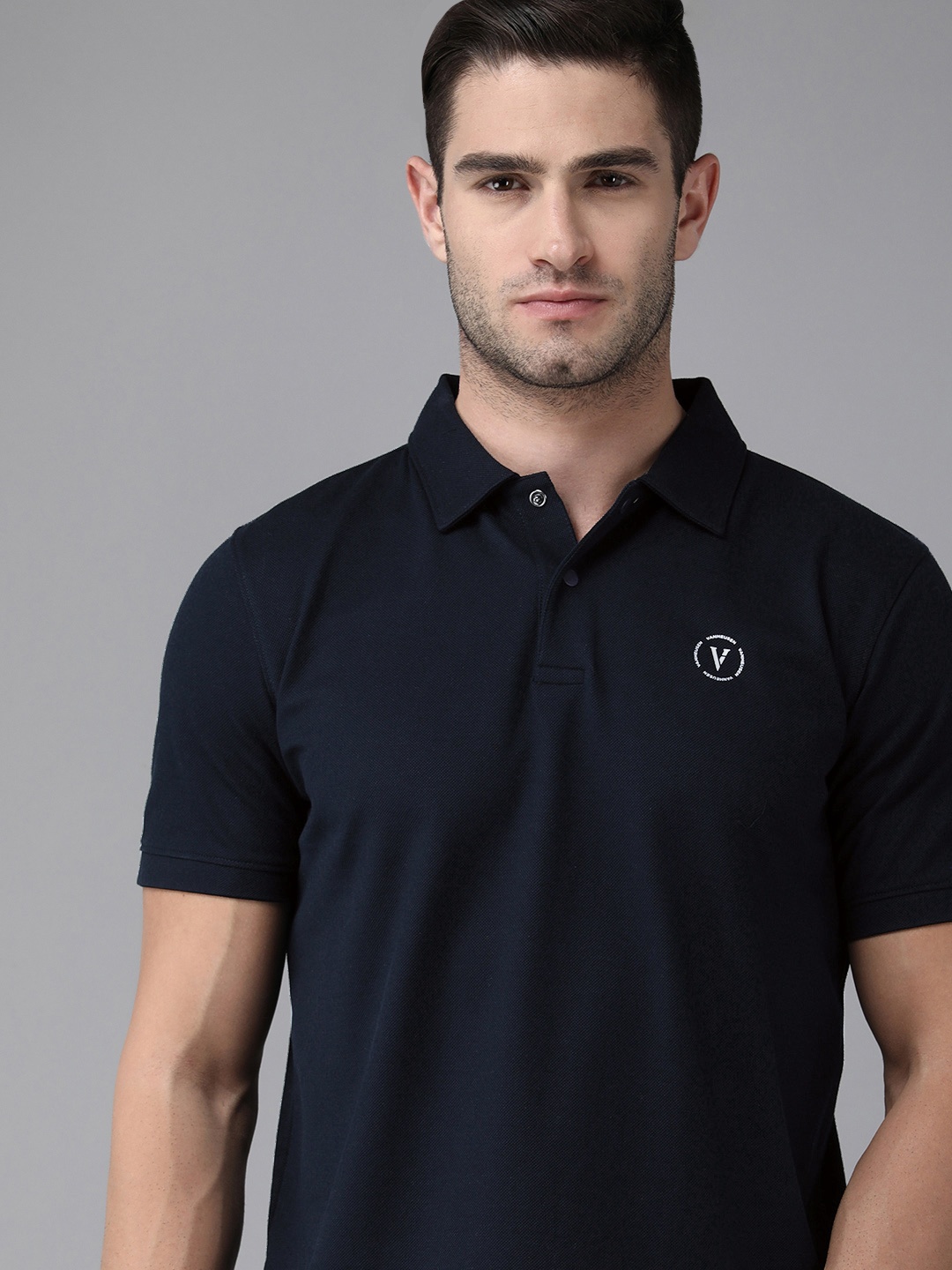 

Van Heusen Flex Men Navy Blue Solid Polo Collar Pure Cotton Sports T-shirt
