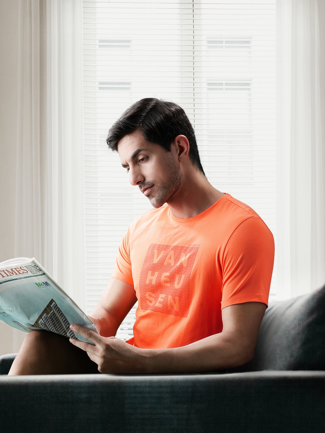 

Van Heusen Flex Men Orange Brand Logo Printed Slim Fit Sports T-shirt
