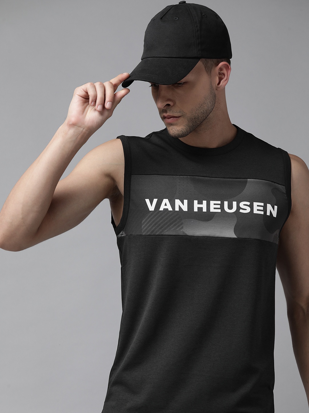 

Van Heusen Flex Men Golf Brand Logo Printed Active Fit Sports T-shirt, Black