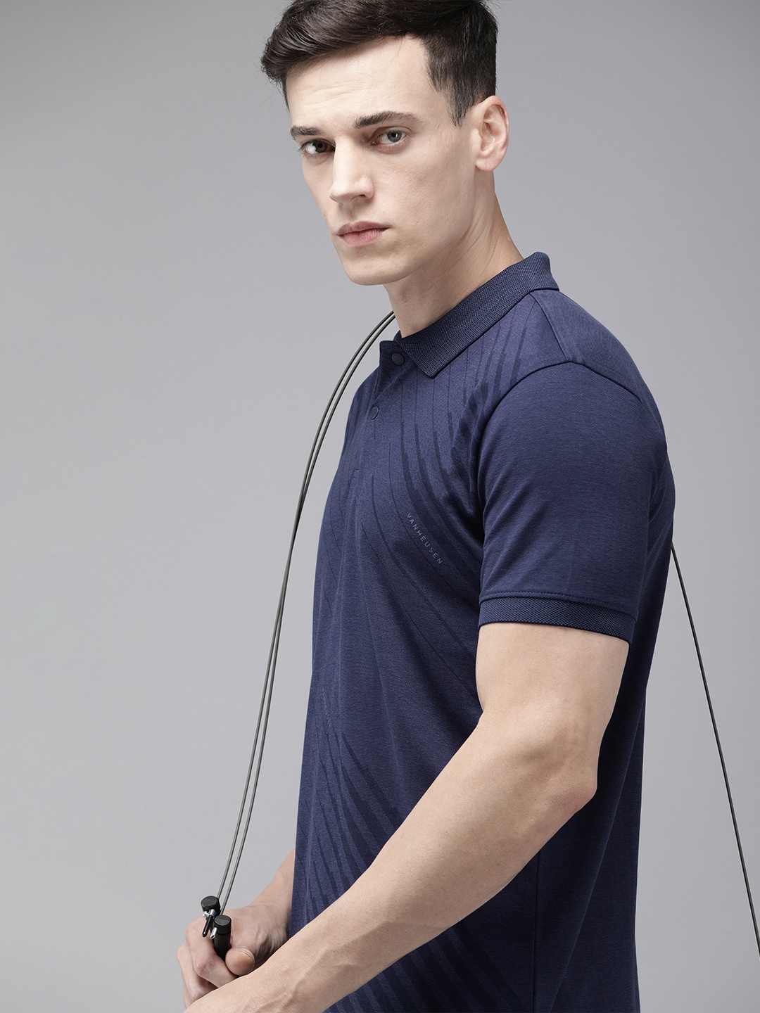 

Van Heusen Flex Men Navy Blue Striped Polo Collar Sports T-shirt