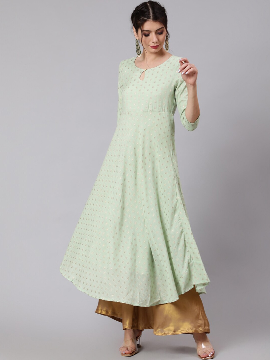 

Awadhi Women Green Yoke Design Keyhole Neck Flared Sleeves Chanderi Silk Chanderi Silk Anarkali Kurta