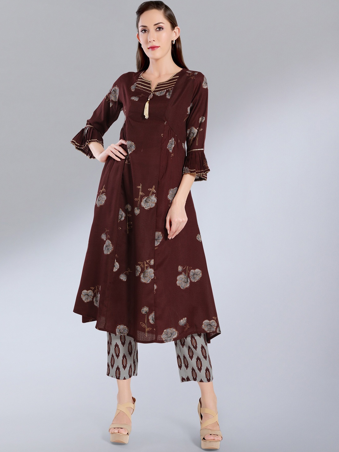 

MADHURAM Women Maroon Floral Printed Kurta with Trousers