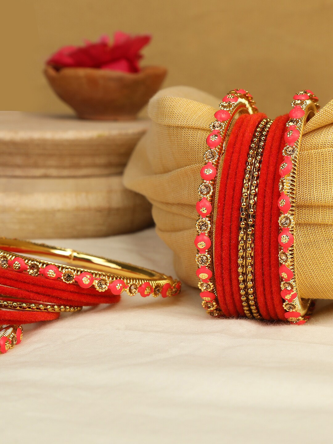 

AccessHer Set Of 20 Gold-Plated & Red Stone-Studded Bangles