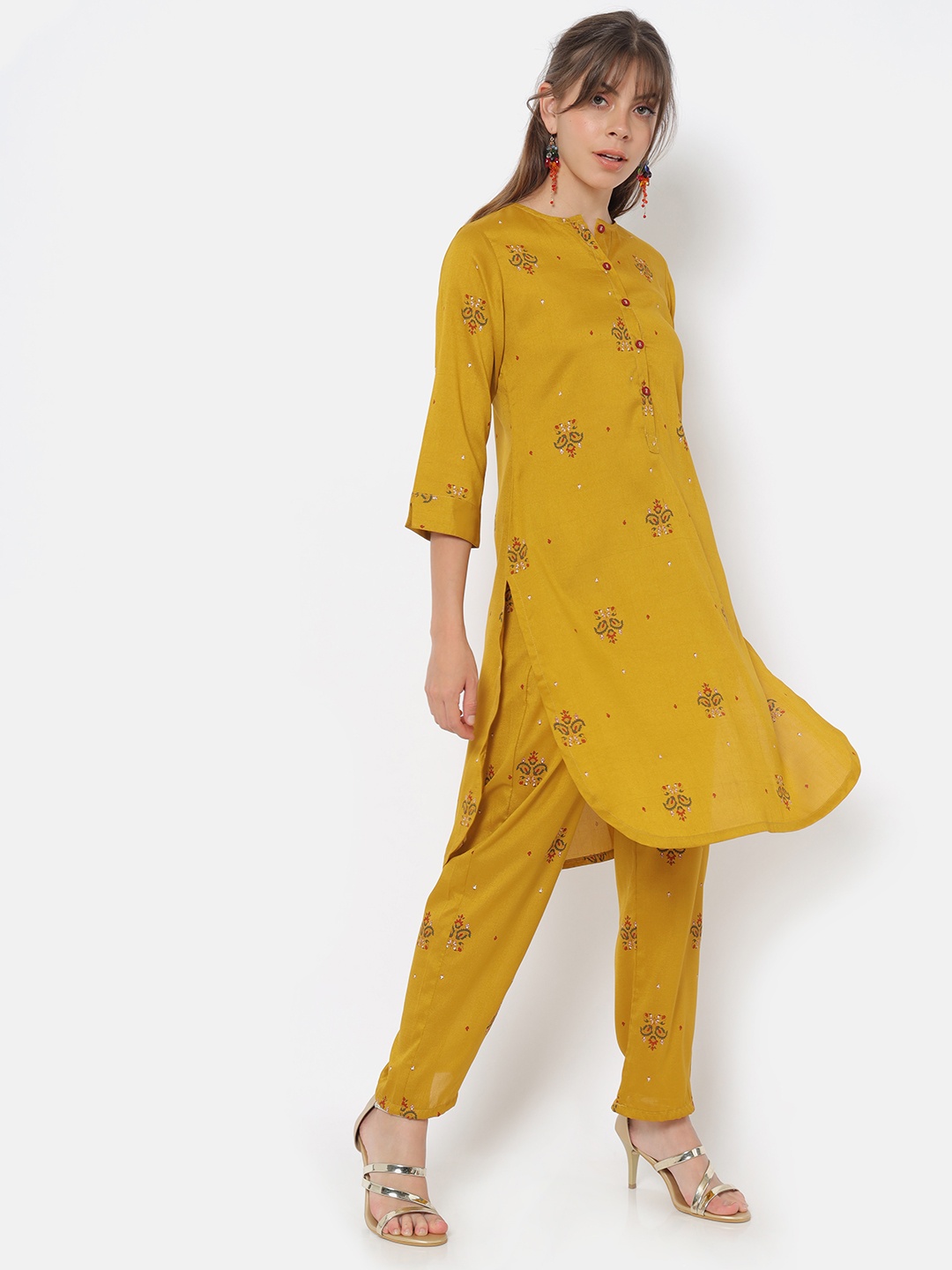 

Saaki Women Mustard Yellow Ethnic Motifs Printed Trousers