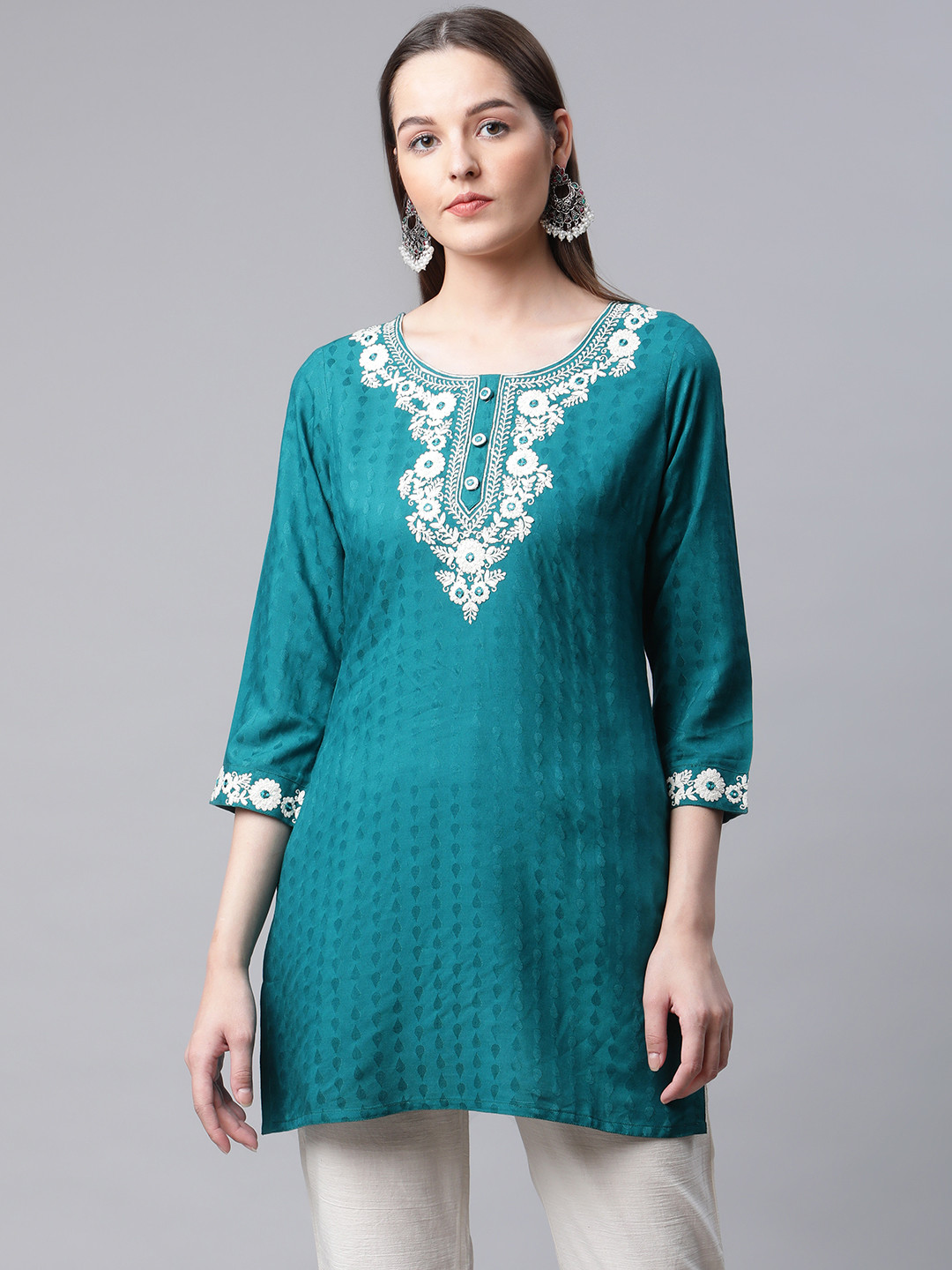

AMIRAS INDIAN ETHNIC WEAR Turquoise Blue Floral Yoke Design Thread Work Modal Thread Work Kurti