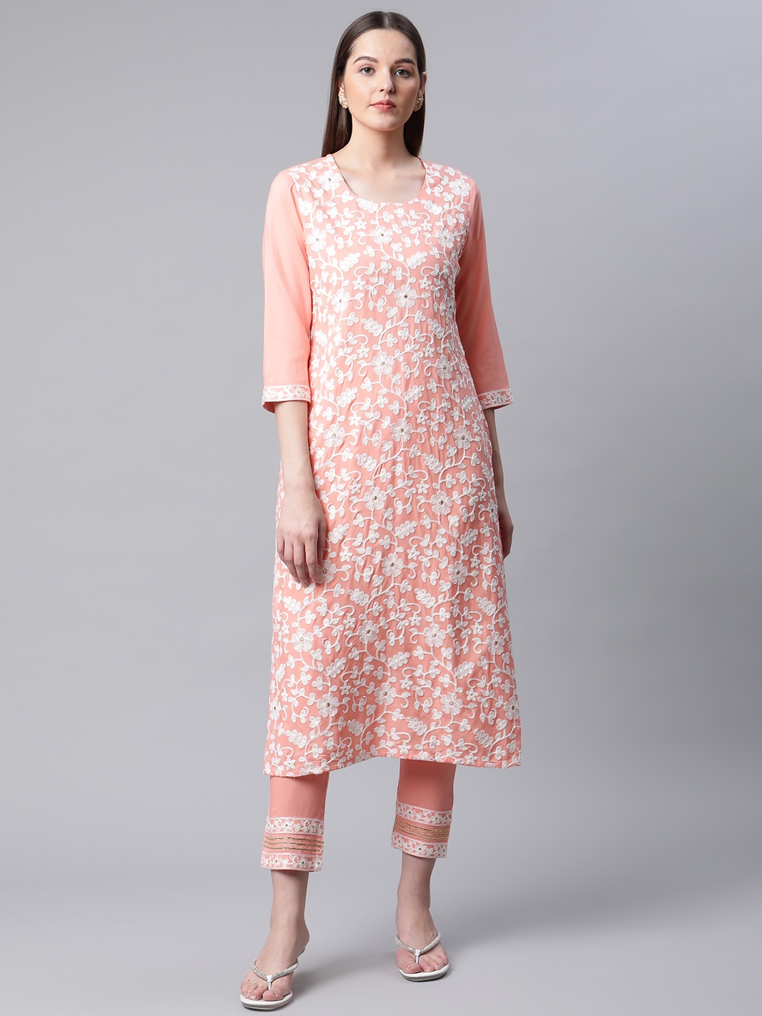 

AMIRAS INDIAN ETHNIC WEAR Women Peach-Coloured Floral Kurta with Palazzos