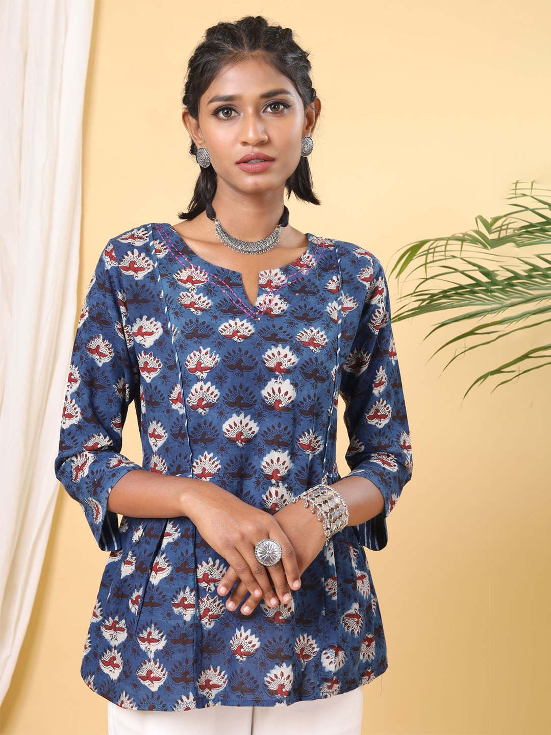 

Shuddhi Women Blue Floral Print Keyhole Neck Peplum Top