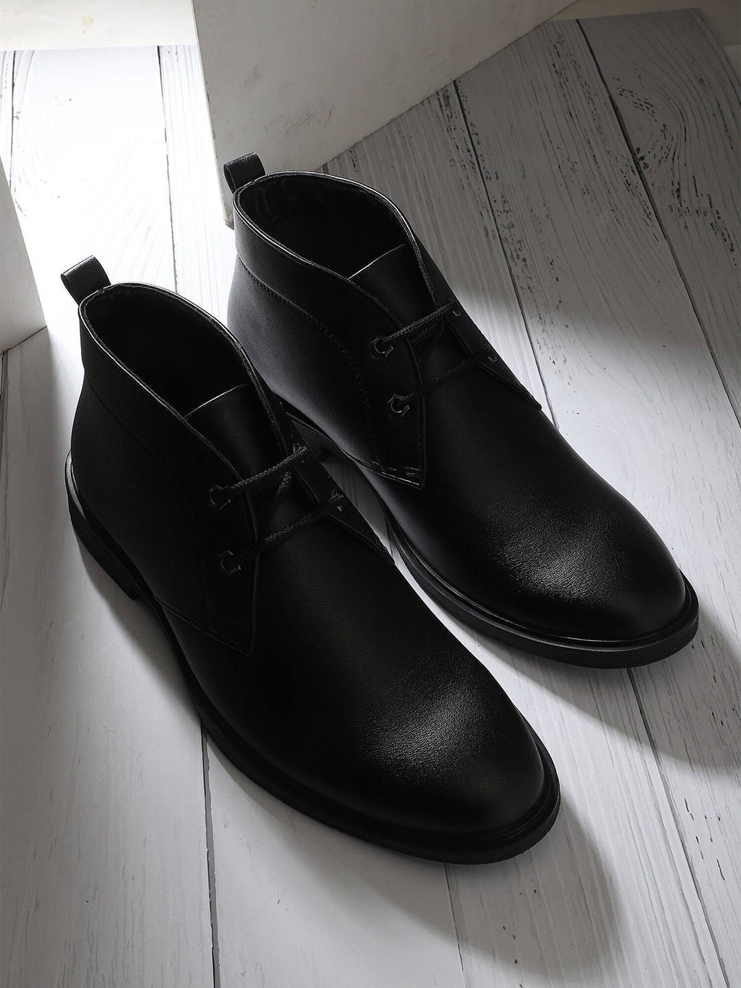 

Carlton London Men Black Solid Boots