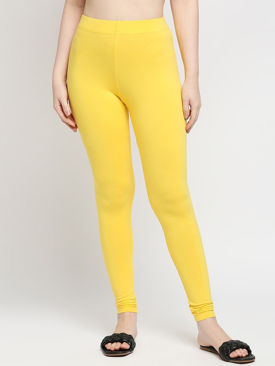 

ZRI Women Yellow Solid Churidar-Length Leggings