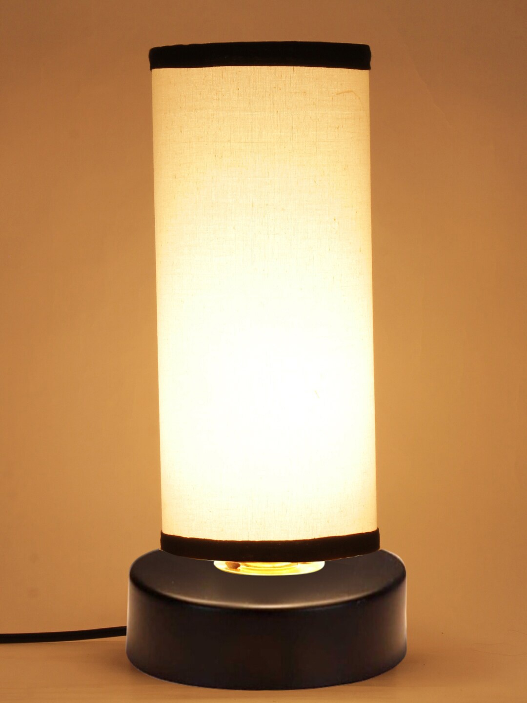 

Devansh White Cotton shade with Round Iron Base Table Lamp