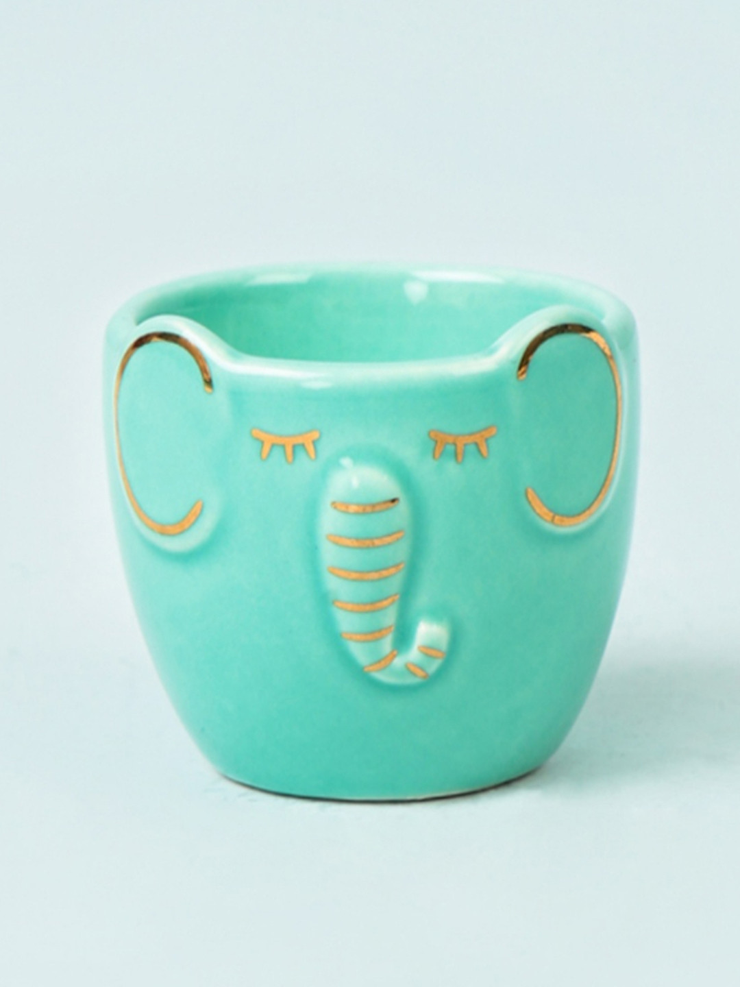 

Chumbak Sea Green & Gold-Toned Textured Ceramic Matte Cup