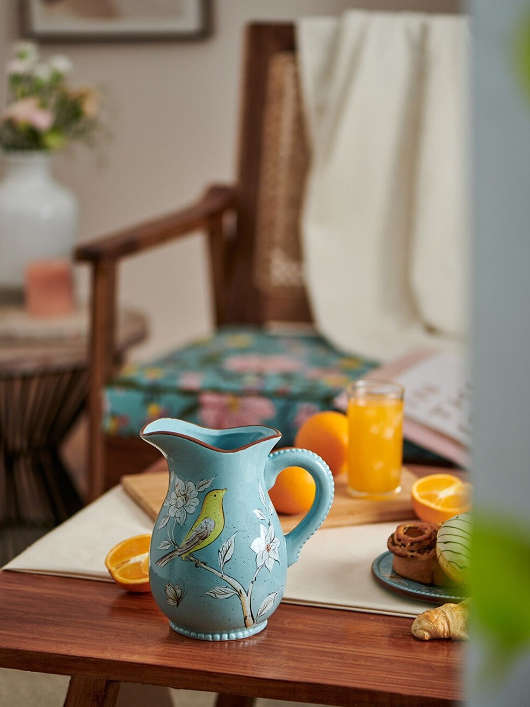 

Chumbak Blue Printed Floral Bird Milk Pitcher