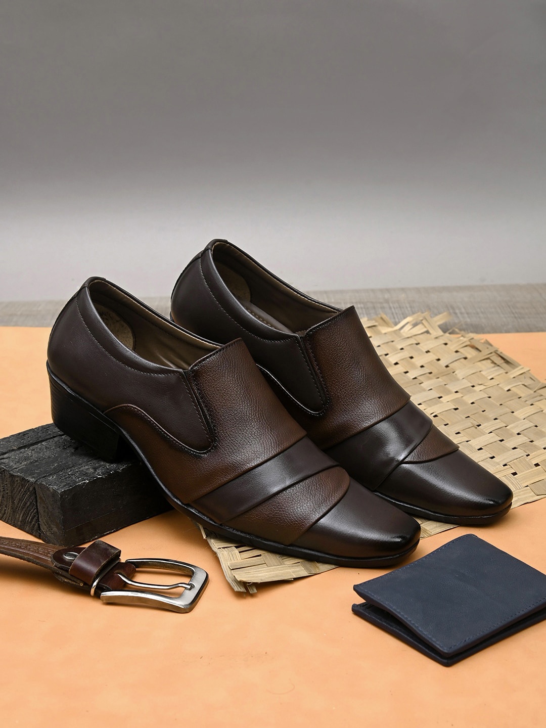 

Sir Corbett Men Brown & Black Textured Formal Slip-on Shoes