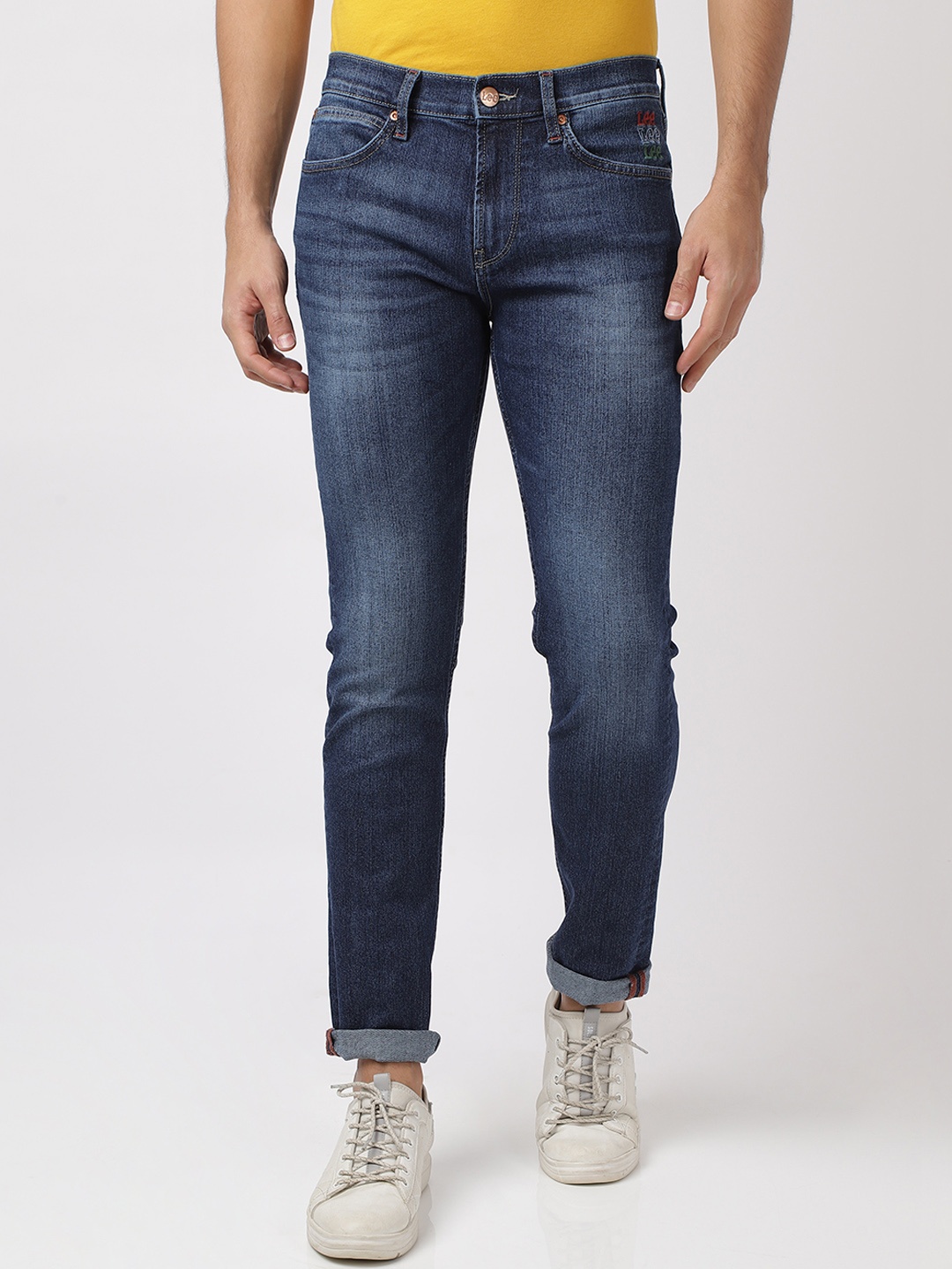 

Lee Men Blue Tapered Fit Mildly Distressed Light Fade Stretchable Jeans
