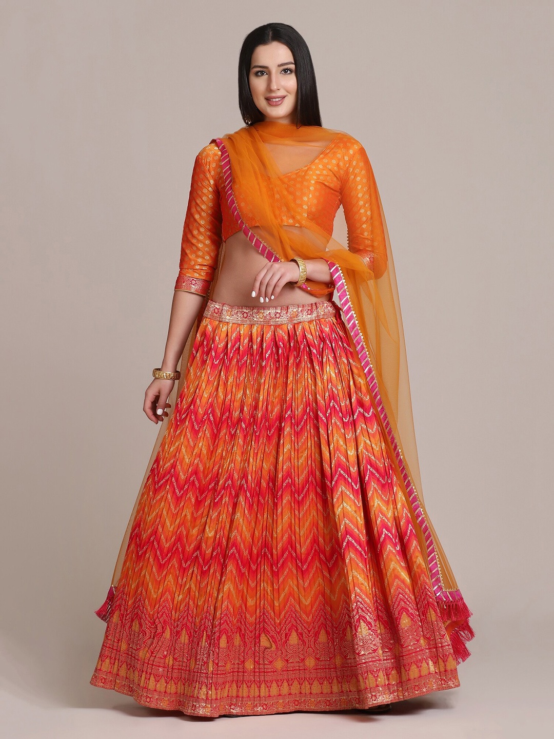 

Warthy Ent Orange & Gold-Toned Semi-Stitched Lehenga Choli With Dupatta