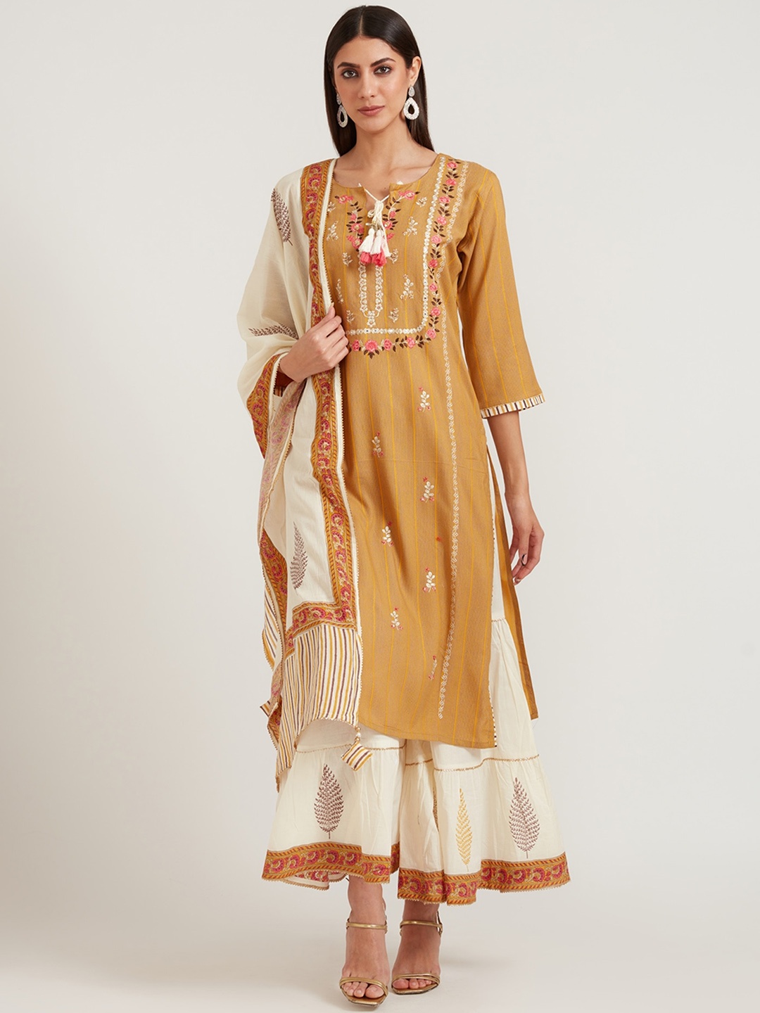 

Neerus Women Gold Ethnic Motifs Printed Kurta with Churidar & With Dupatta