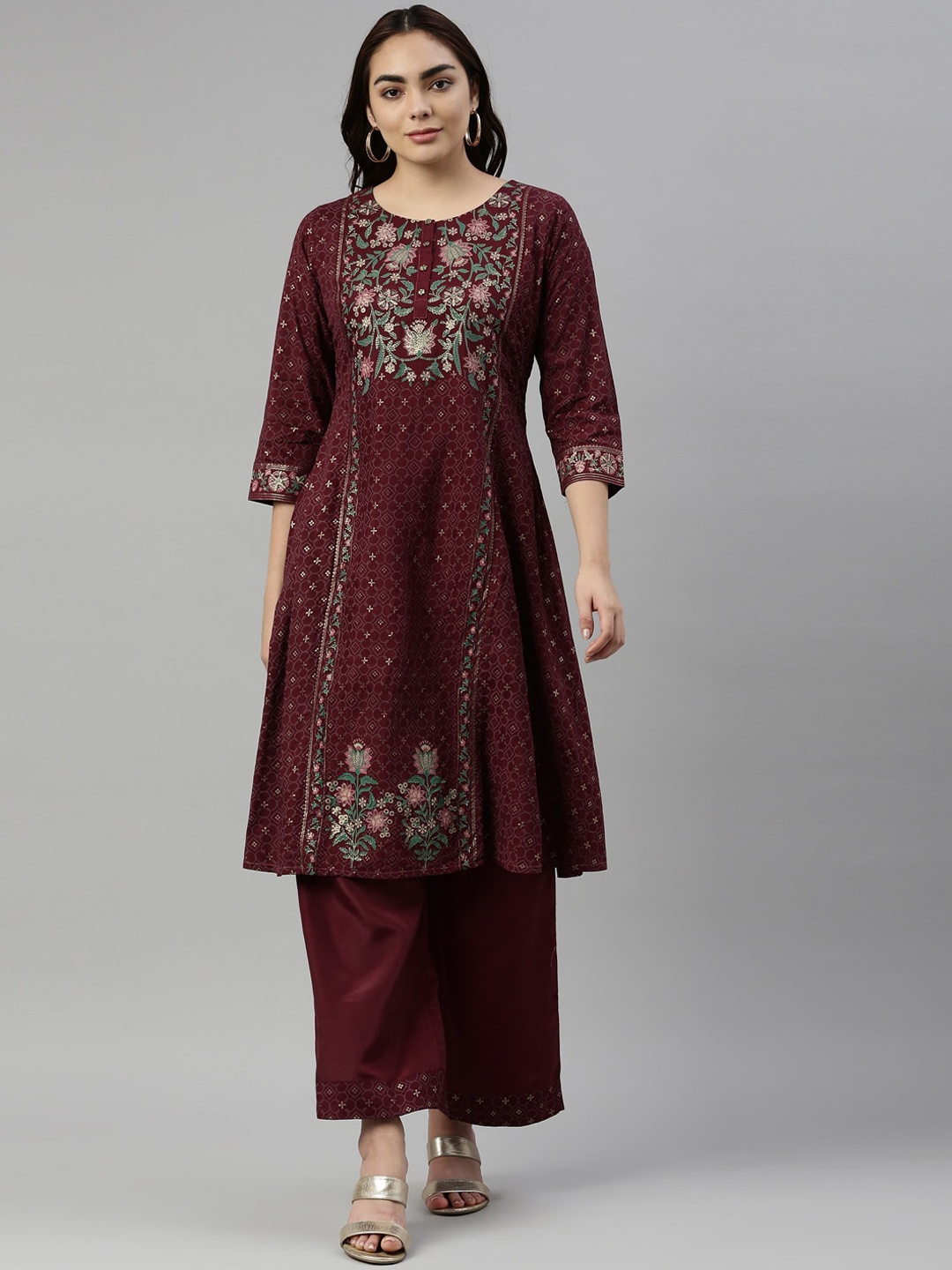 

Neerus Women Burgundy Floral Printed Kurti with Trousers