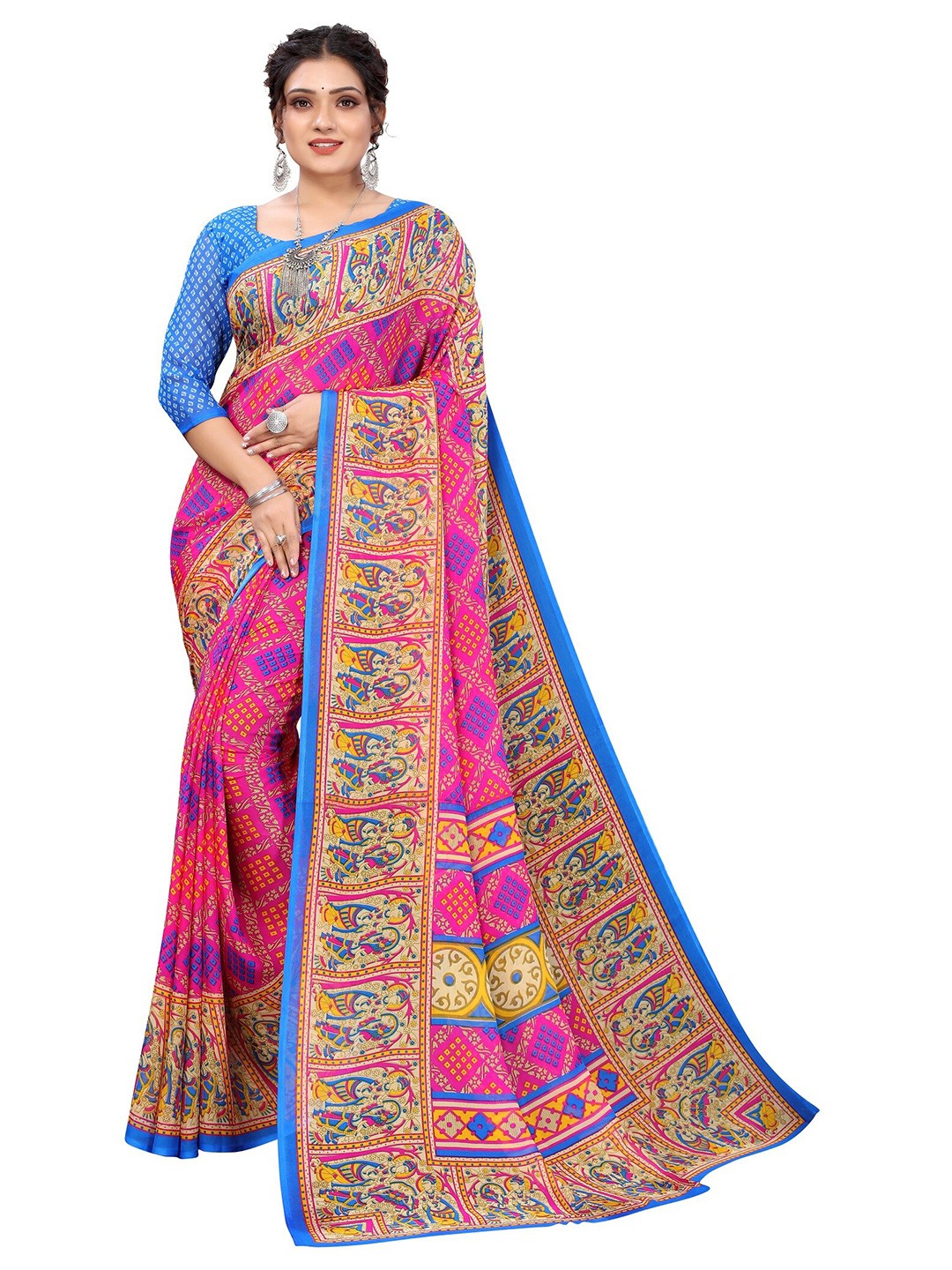 

Yashika Pink & Blue Ethnic Motifs Zari Georgette Saree