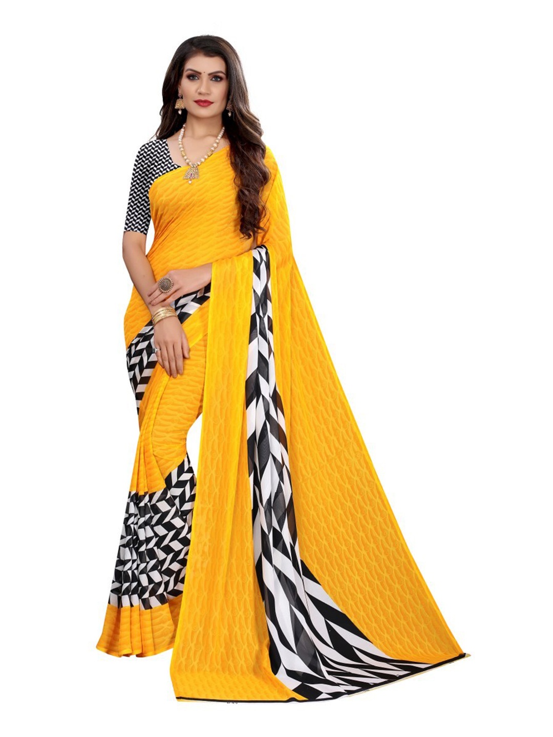 

Yashika Yellow & Black Printed Saree