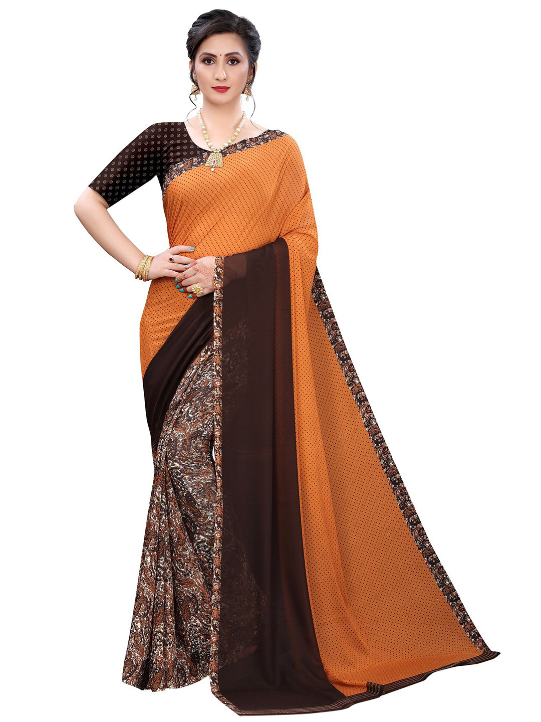 

Yashika Orange & Brown Floral Saree