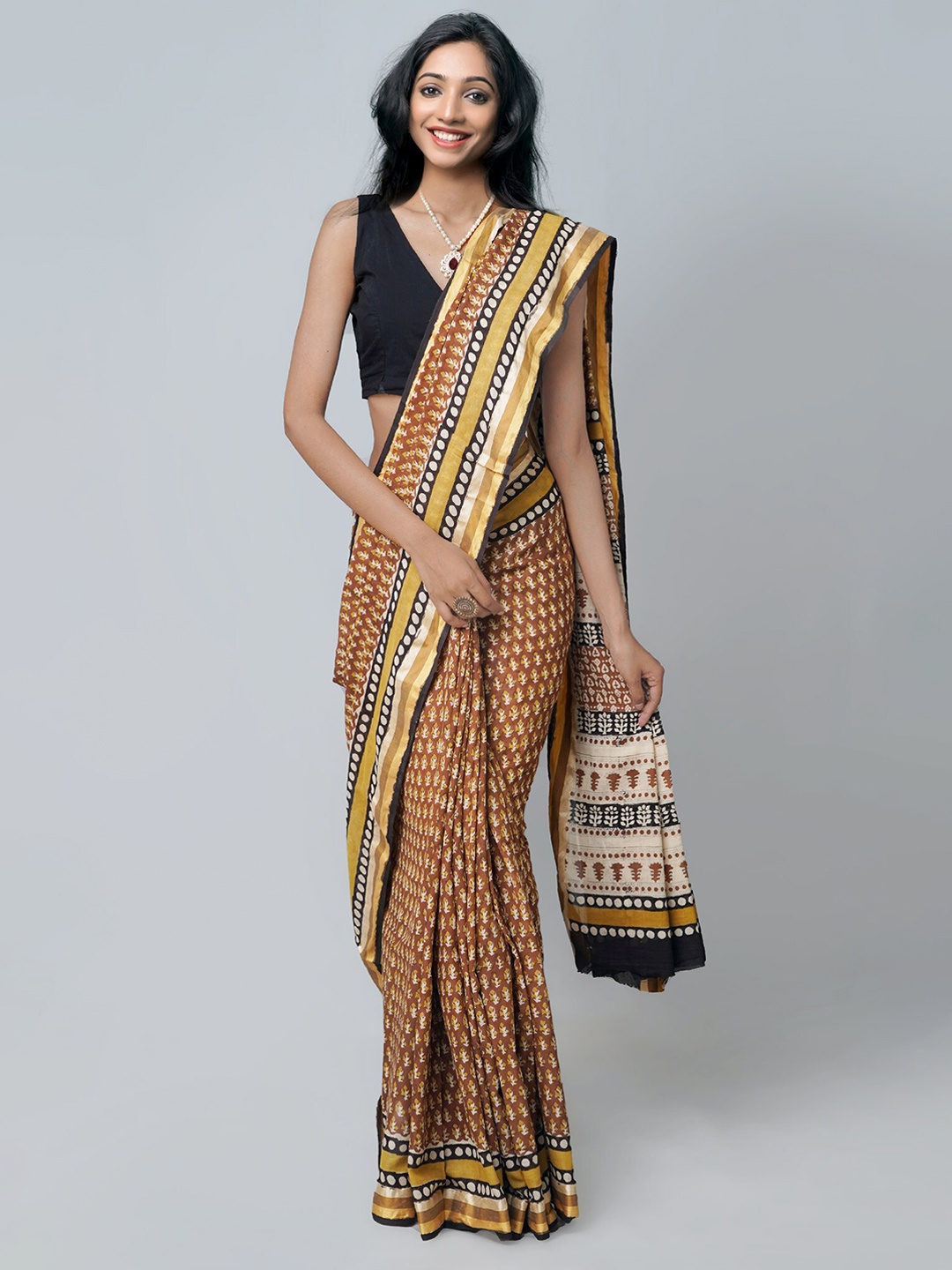 

Unnati Silks Brown & White Ethnic Motifs Pure Cotton Block Print Saree