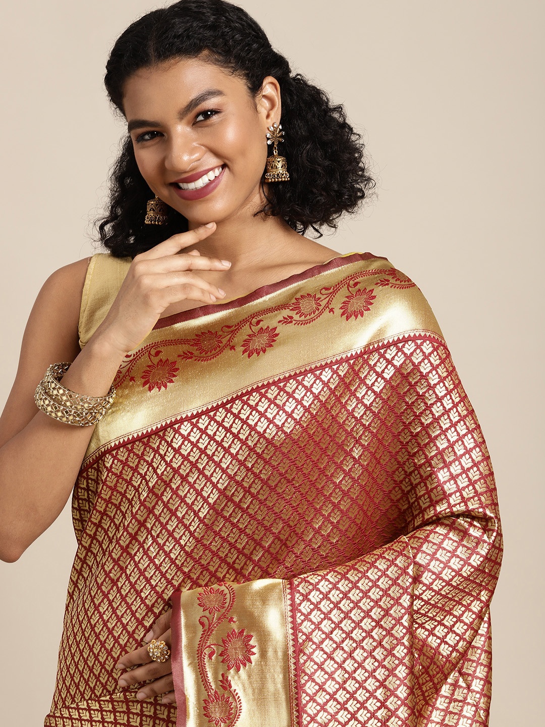 

Mitera Maroon & Golden Ethnic Motifs Woven Design Banarasi Saree