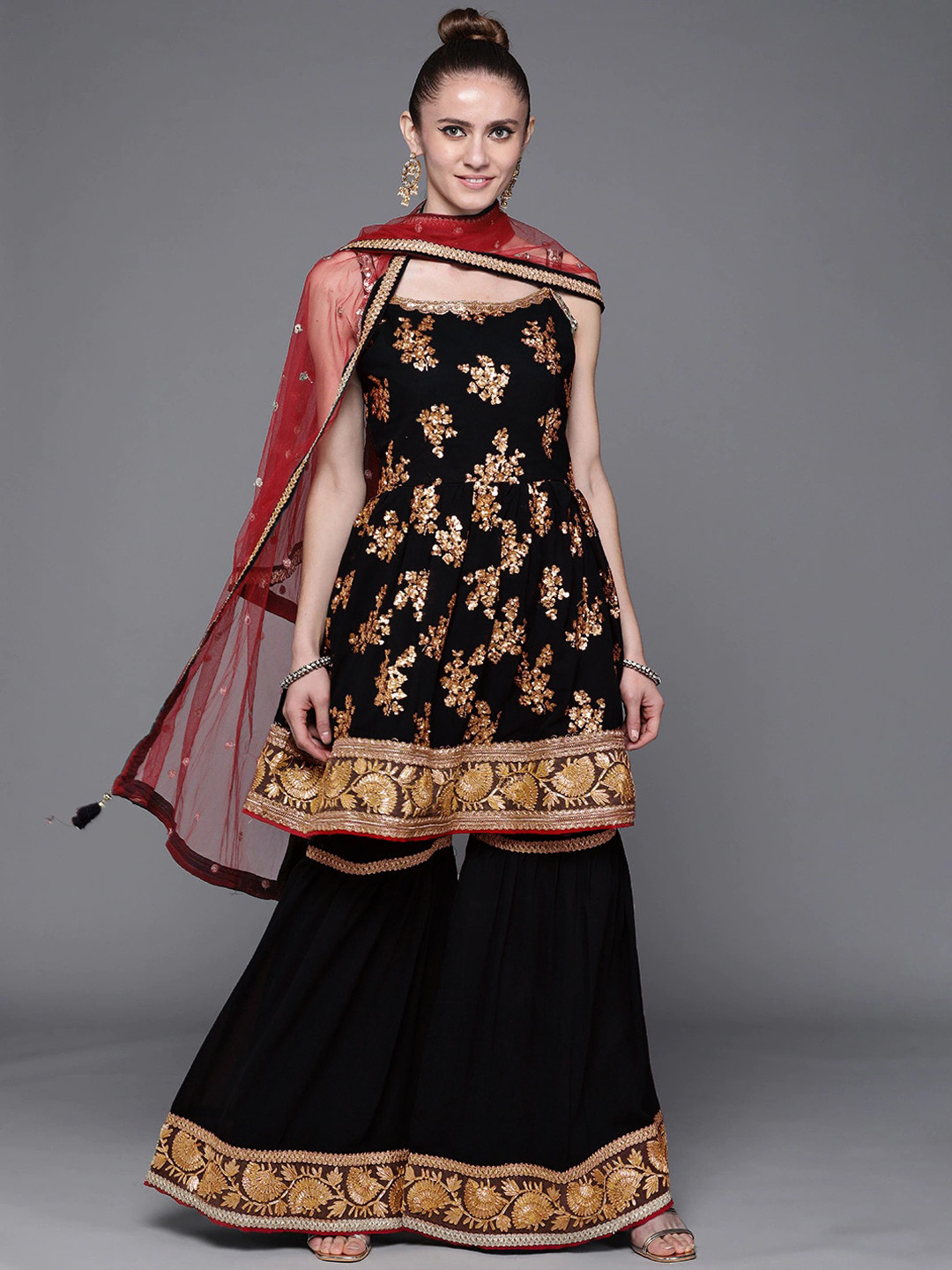 

Chhabra 555 Women Black Ethnic Motifs Embroidered Pleated Sequinned Kurti with Sharara & With Dupatta