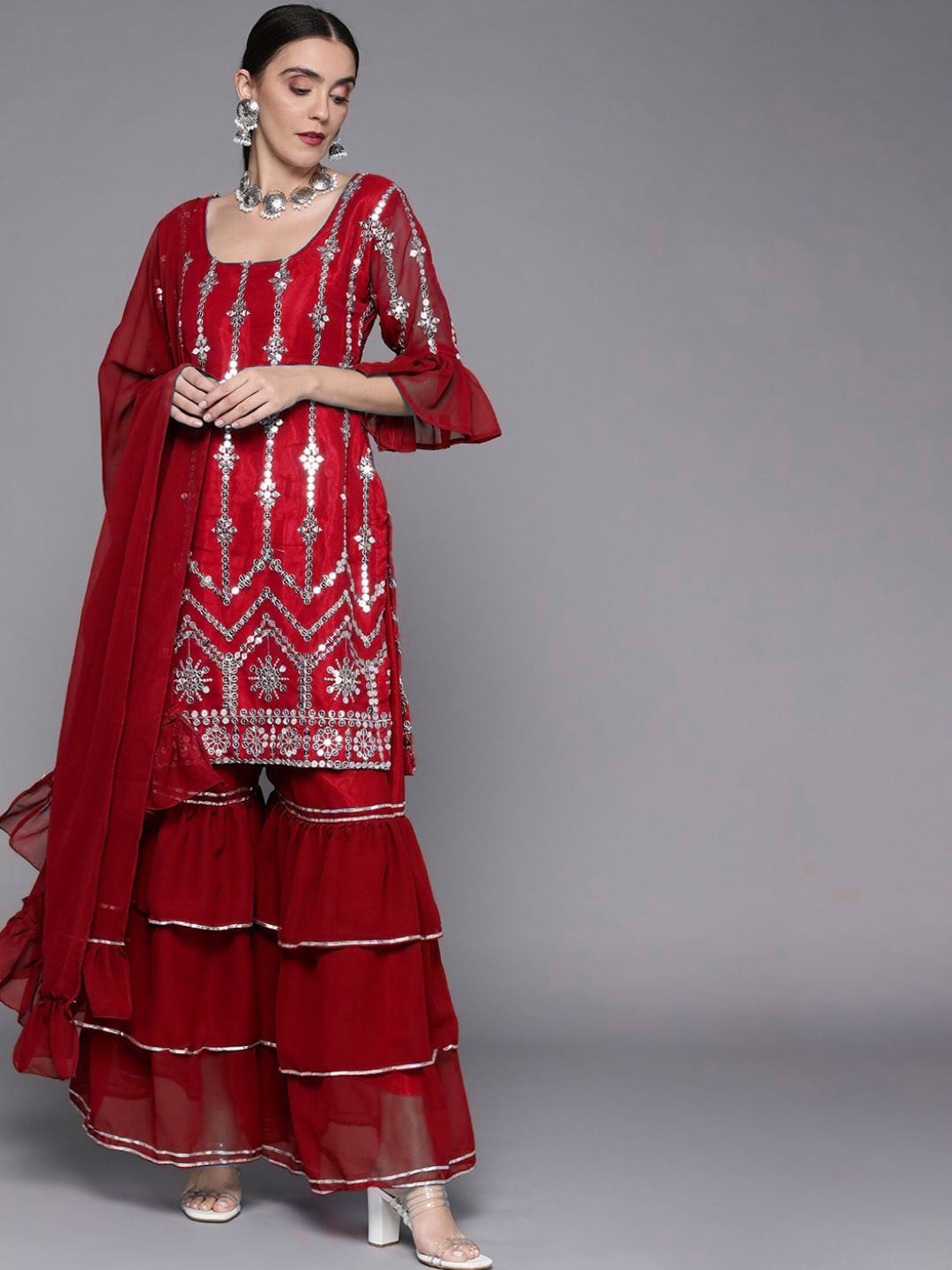 

Chhabra 555 Women Red Ethnic Motifs Embroidered Mirror Work Kurti with Sharara & With Dupatta