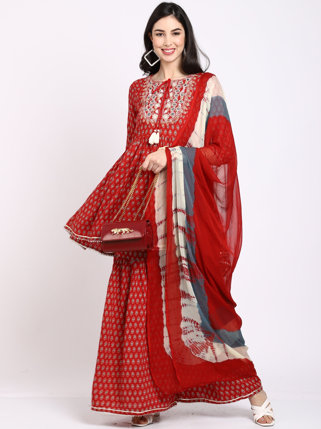 

Rajnandini Women Maroon Ethnic Motifs Printed Panelled Mirror Work Kurti with Sharara & With Dupatta