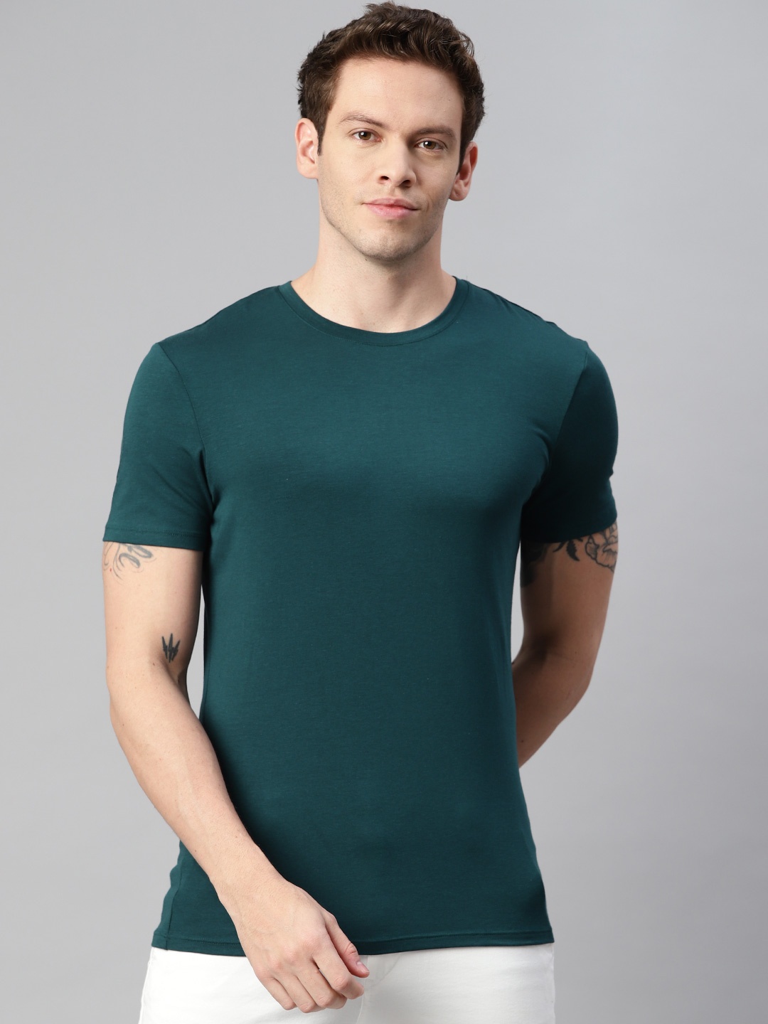 

Marks & Spencer Men Green Solid T-shirt