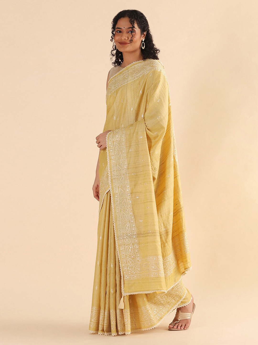 

Taneira Yellow & White Ethnic Motifs Embroidered Pure Silk Tussar Saree