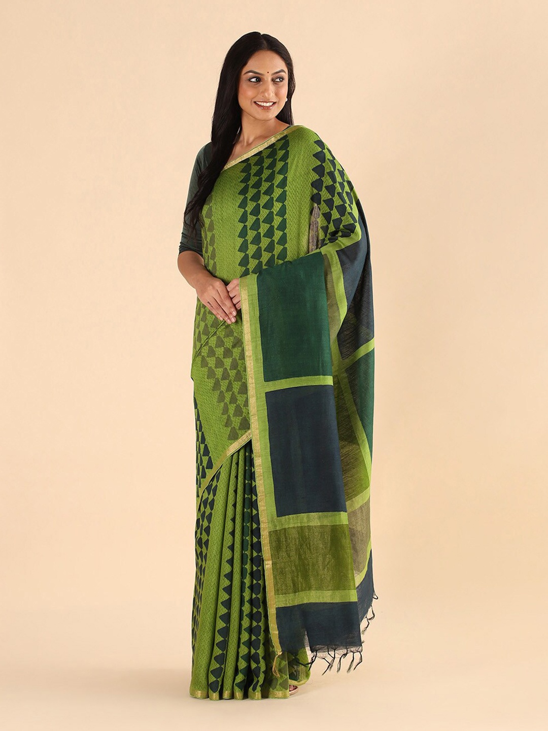 

Taneira Green & Olive Green Zari Pure Silk Tussar Saree