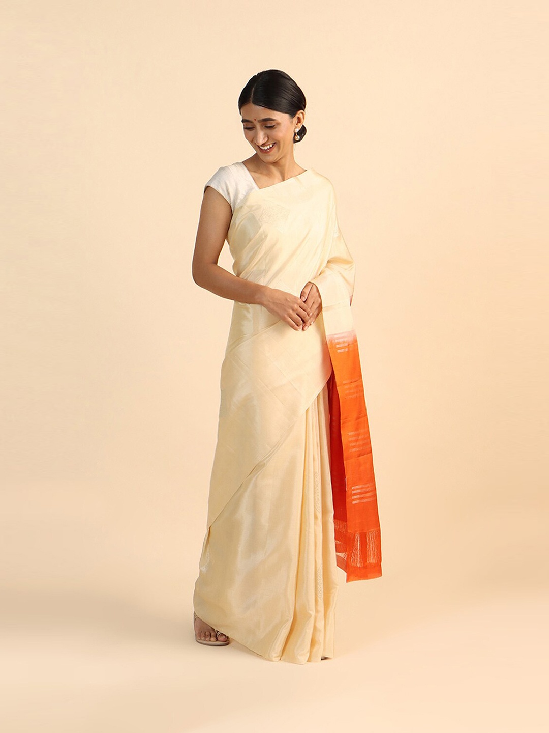 

Taneira Beige & Orange Woven Design Zari Pure Silk Saree