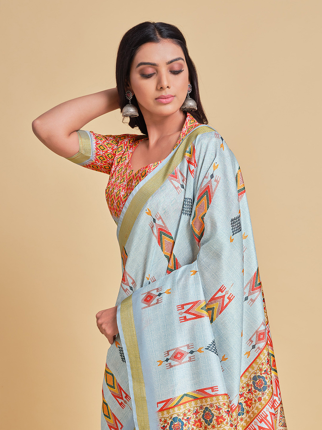 

Sangria Turquoise Blue & Red Silk Blend Kanjeevaram Saree