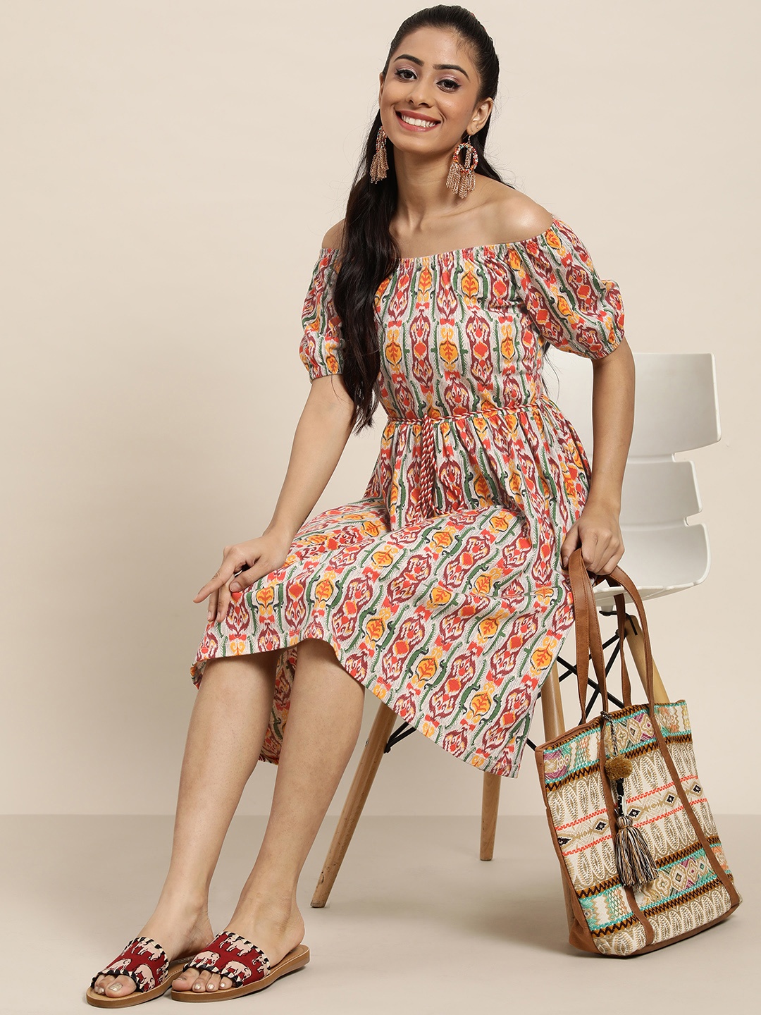 

Sangria Women Cream-Coloured & Orange Ethnic Motifs Printed Off-Shoulder A-Line Dress