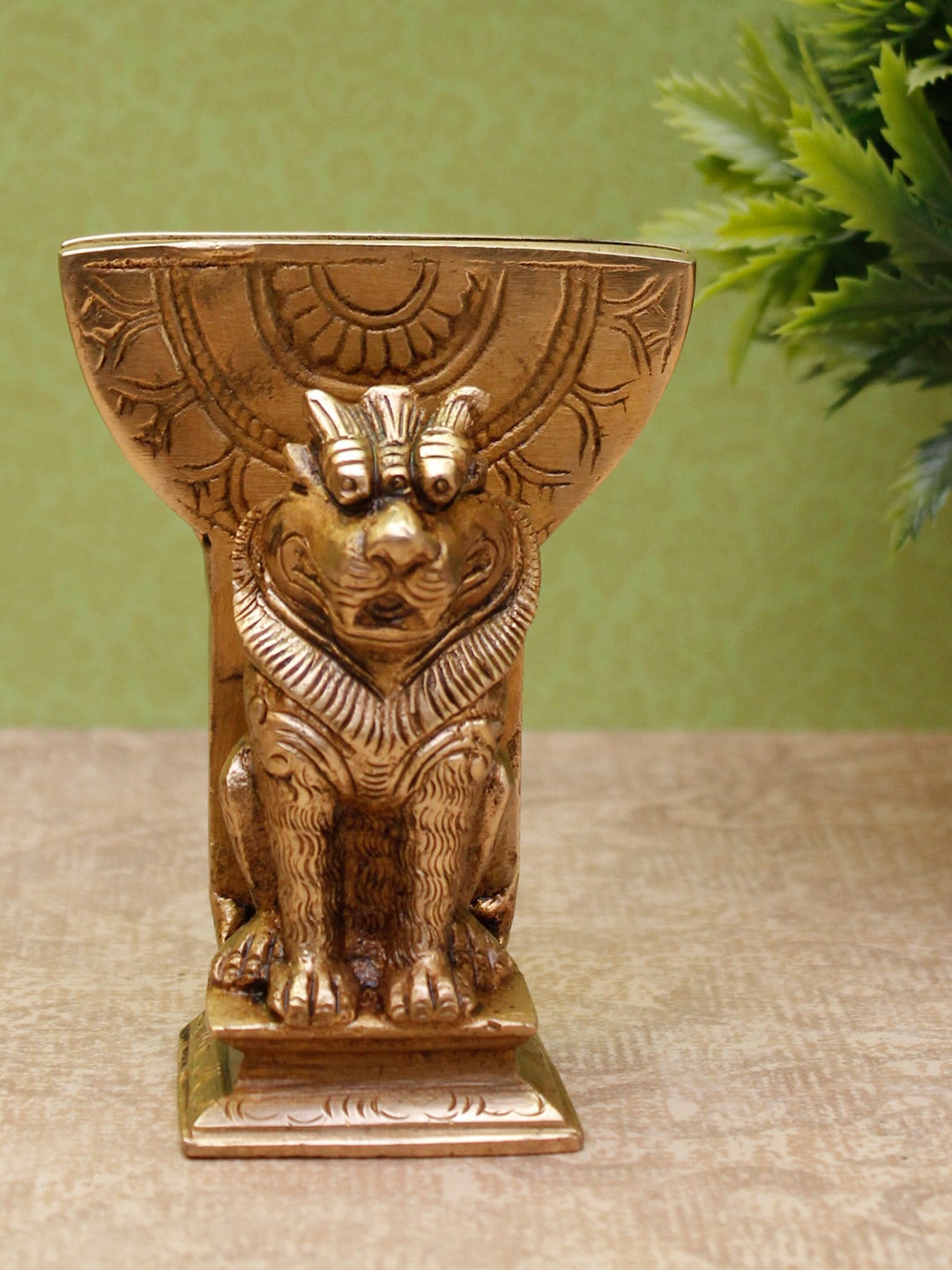 

StatueStudio Gold-Toned Sitting Lion Shaped Card Holder Showpiece