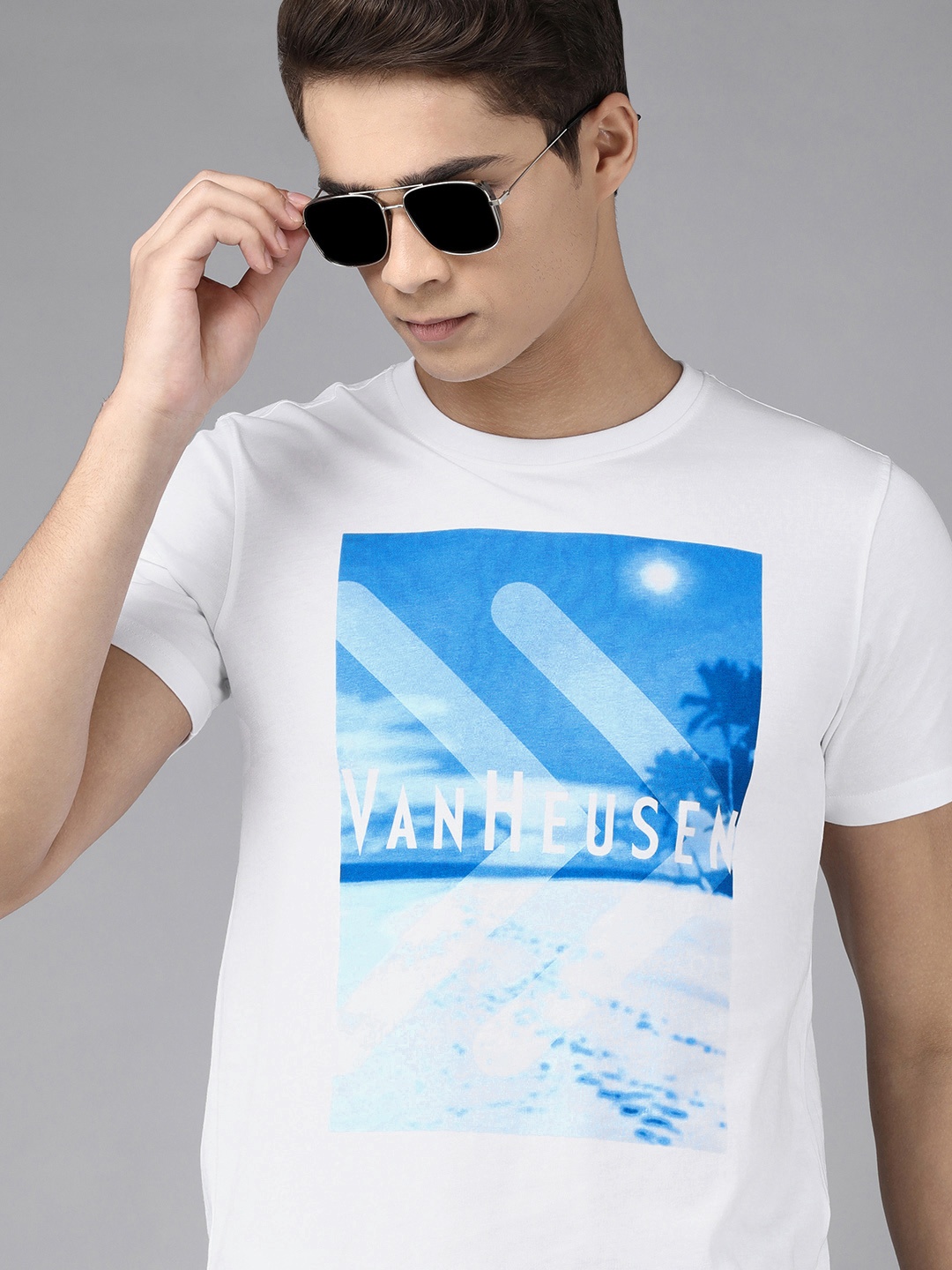 

Van Heusen Sport Men White & Blue Typography Printed Pure Cotton T-shirt