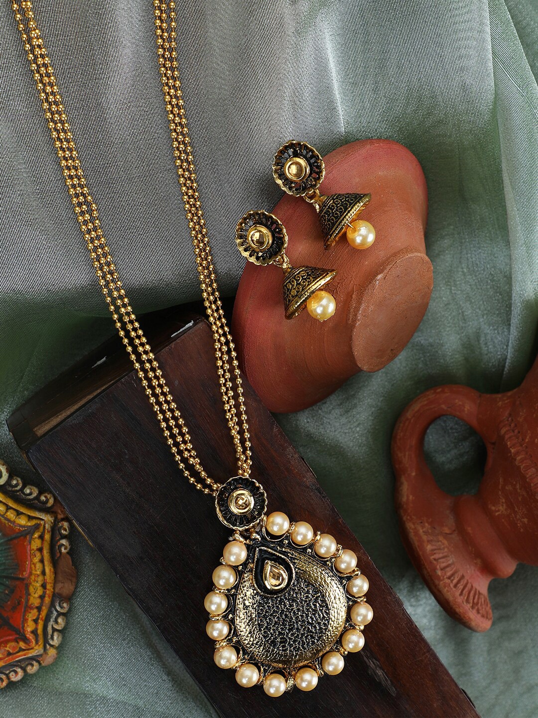 

ANIKAS CREATION Gold Plated & Black Jewellery Set