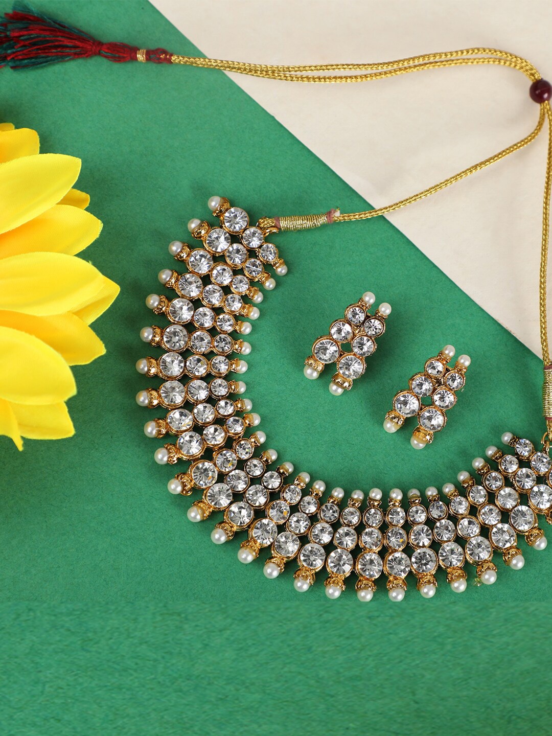 

ANIKAS CREATION Women Gold-Plated & White CZ Studded Jewellery Set