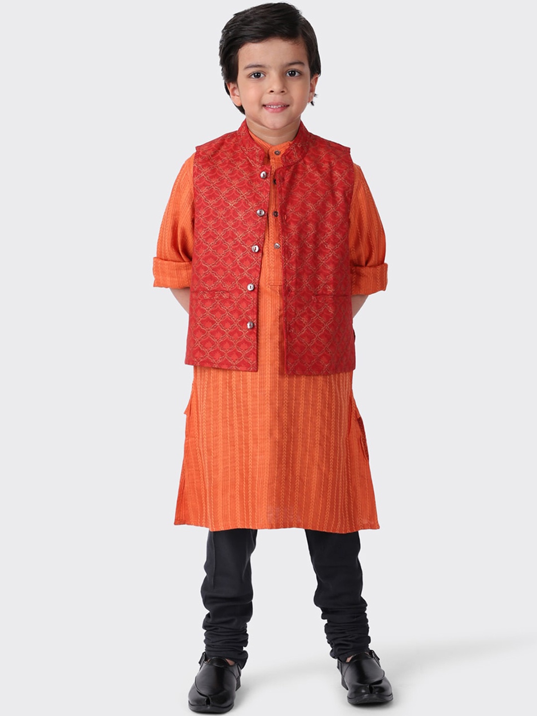 

Fabindia Boys Rust & Black Striped Layered Kurta with Churidar & Nehru Coat