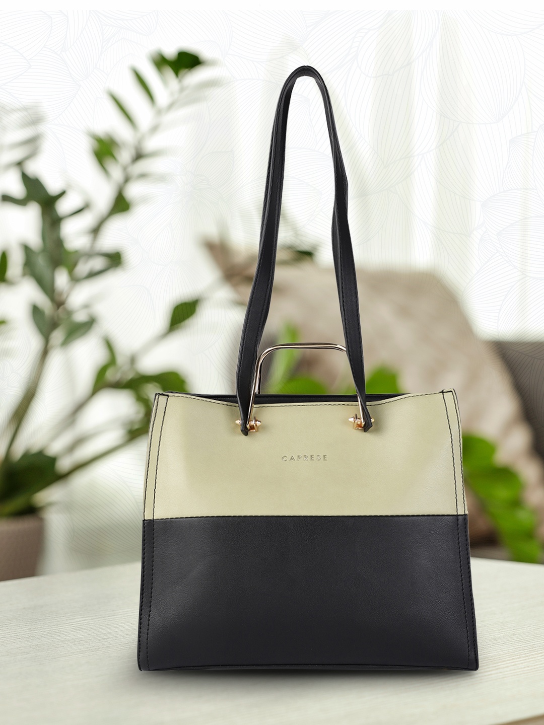 

Caprese Women Black Colourblocked Structured Shoulder Bag