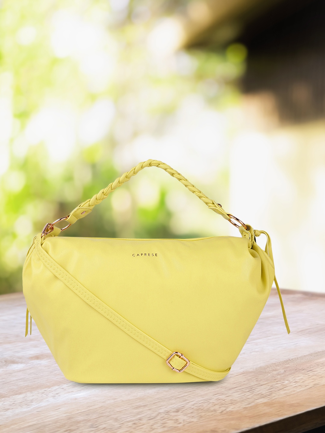 

Caprese Yellow Solid Structured Shoulder Bag