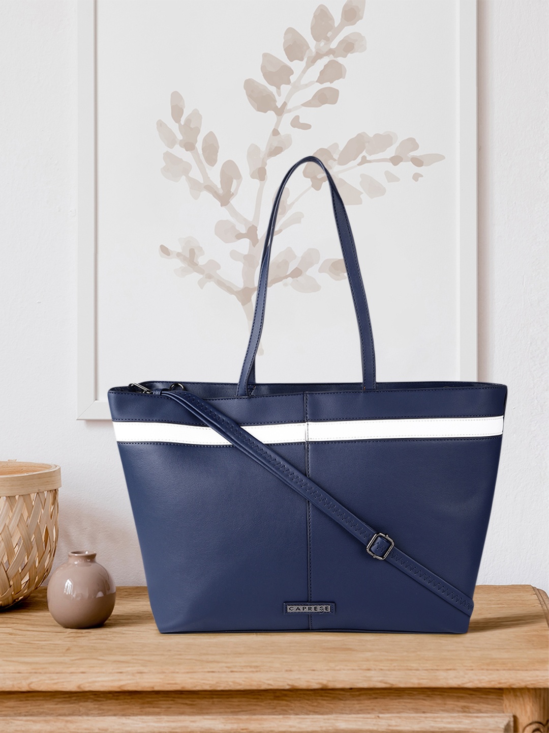 

Caprese Women Blue Solid Laptop Shoulder Bag