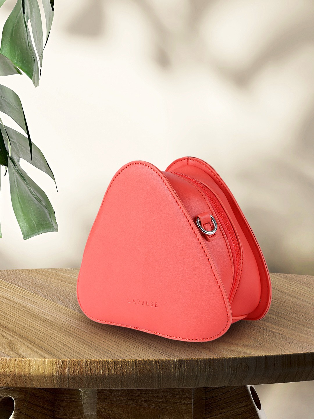 

Caprese Coral Solid Structured Sling Bag
