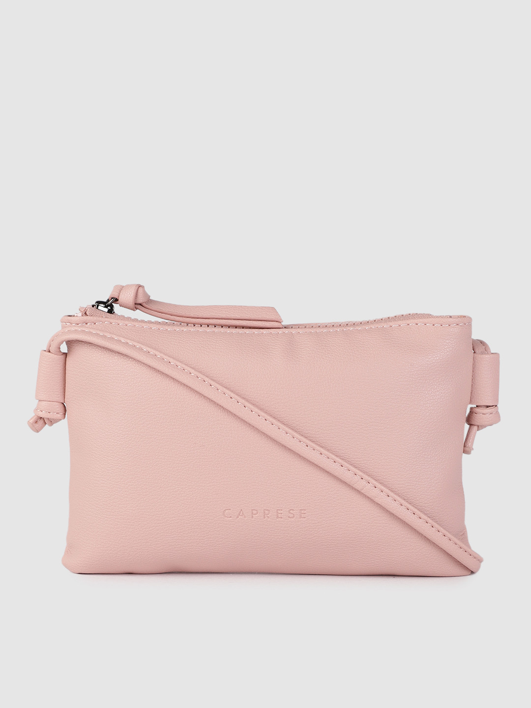 

Caprese Pink Solid Sling Bag