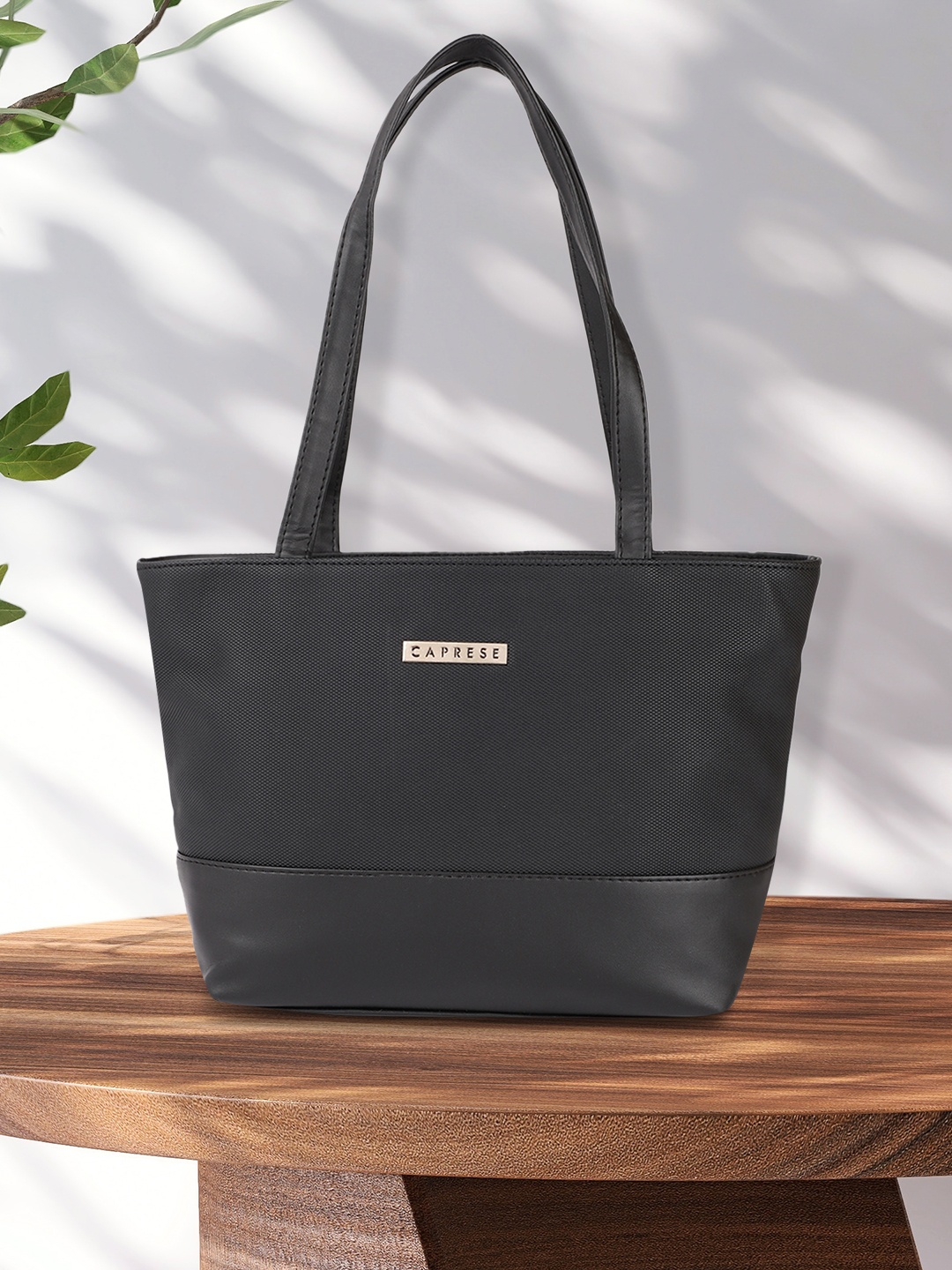 

Caprese Black Textured Structured Shoulder Bag