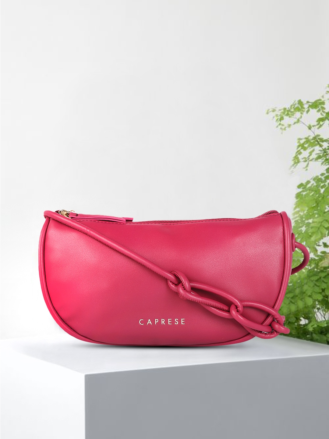 

Caprese Magenta Solid Structured Sling Bag